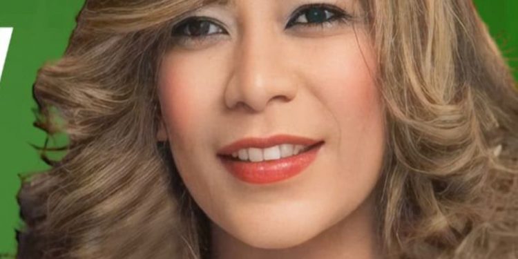 Radhamés Jiménez juramenta en la FP a Carmen Ramírez, dirigente política del exterior