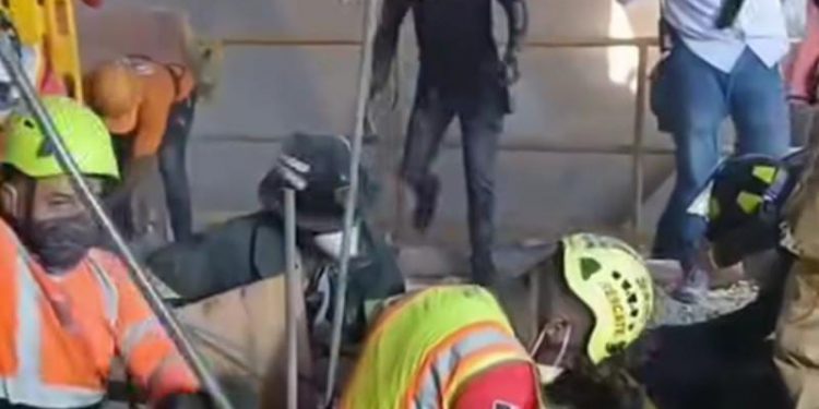 Rescatan con vida a dos obreros atrapados en mina de Cementos Cibao en Santiago